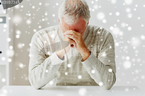 Image of close up of senior man thinking