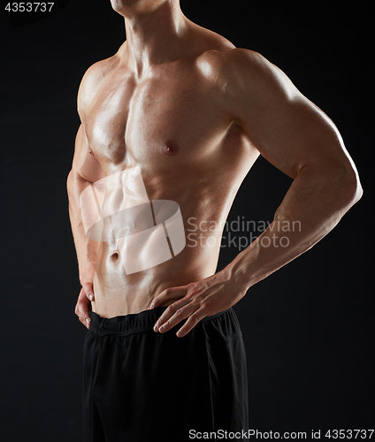 Image of close up of man or bodybuilder with bare torso