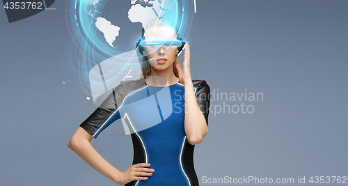 Image of woman in virtual reality 3d glasses with earth