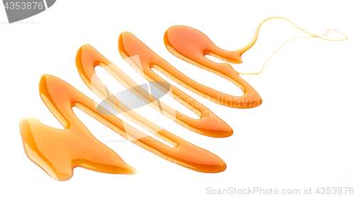 Image of caramel sauce on white background