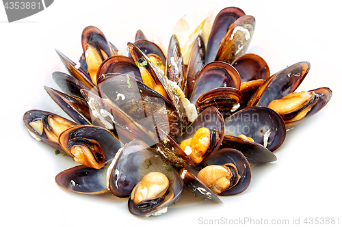 Image of cooked mussels on white background