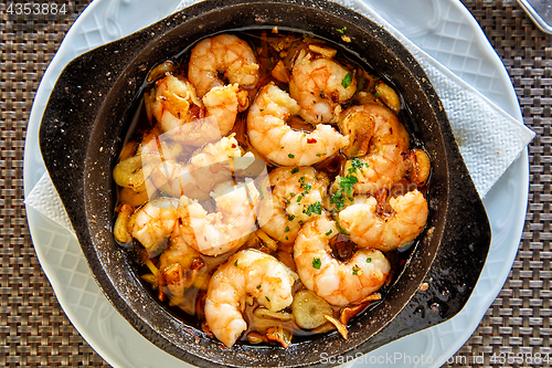 Image of Pan of Garlic prawns