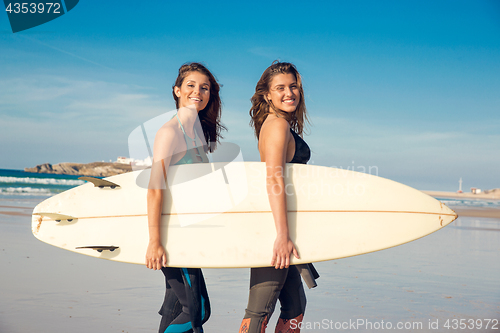 Image of Beaufiul surfer girls