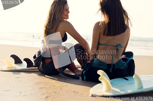 Image of Surfer girls at the beach 