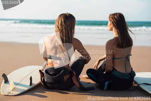 Image of Surfer girls at the beach 