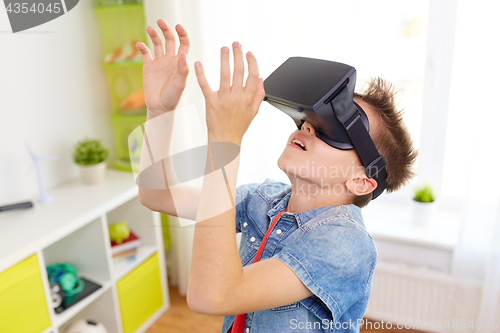 Image of boy in virtual reality headset or 3d glasses