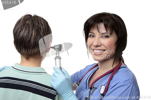 Image of Doctor checking ears with otoscope