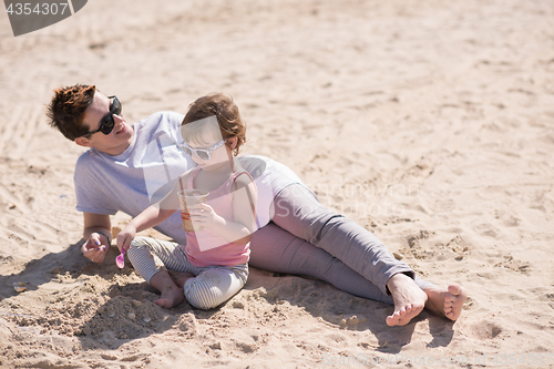 Image of Mom and daughter on the beach