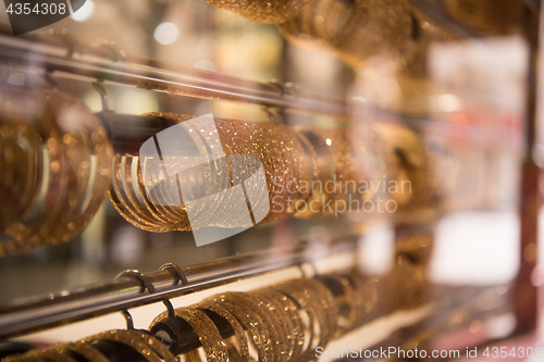 Image of gold jewelry in the shop window