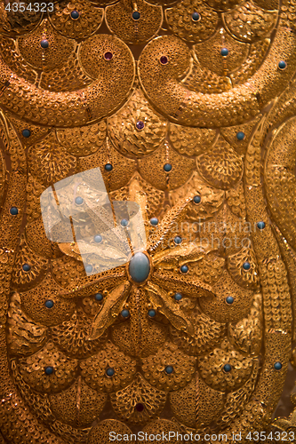 Image of gold jewelry in the shop window