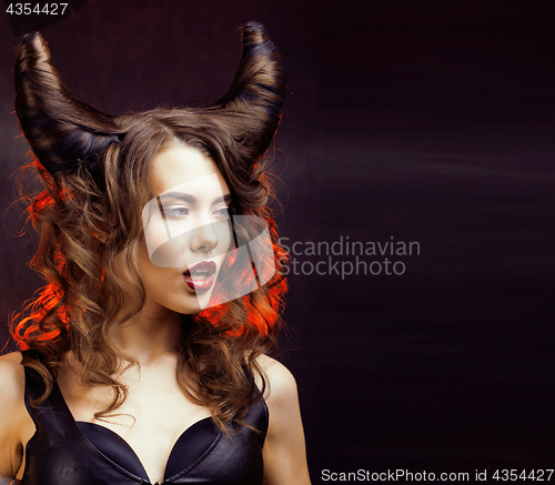 Image of bright mysterious woman with horn hair, halloween celebration