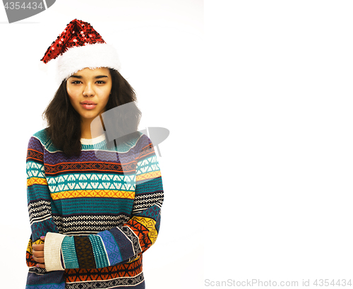 Image of cute young girl in santas red hat isolated