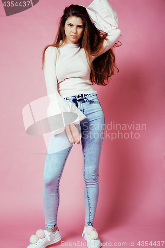 Image of cute pretty redhair teenage girl smiling cheerful on pink background, lifestyle modern people concept