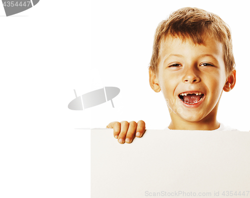 Image of little cute boy holding empty shit to copyspace isolated close u