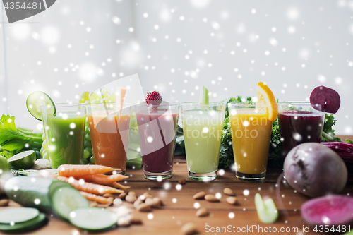 Image of glasses with different fruit or vegetable juices