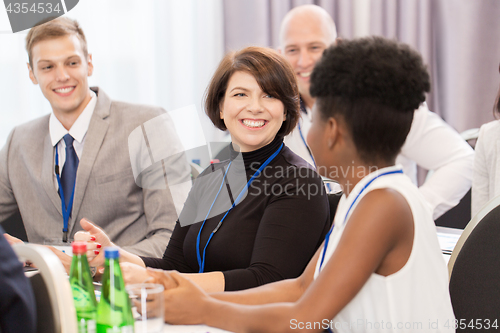 Image of happy business team at international conference