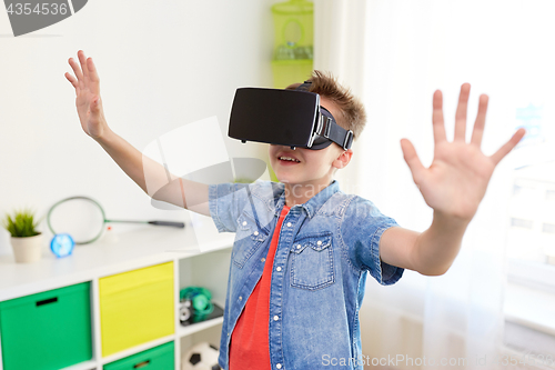 Image of boy in virtual reality headset or 3d glasses