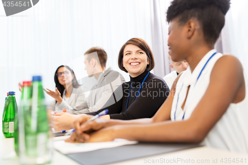 Image of happy business team at international conference