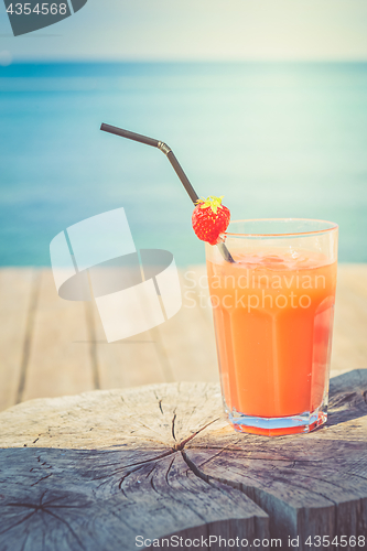 Image of Orange cocktail on the wooden table