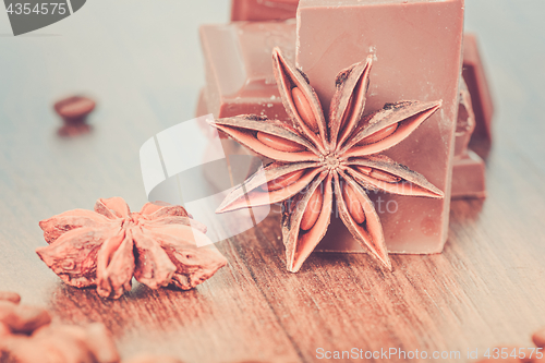 Image of Anise, milk chocolate and coffee beans