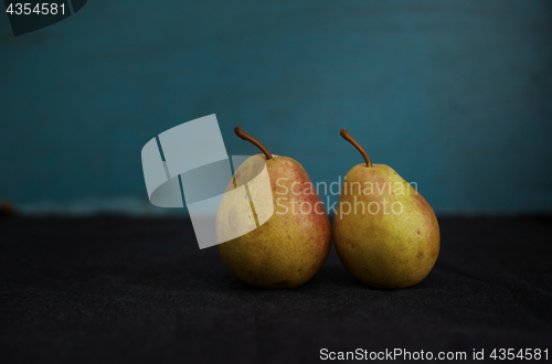 Image of Two fresh pears on a table