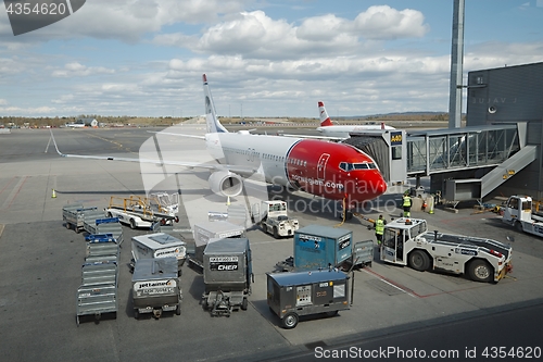 Image of Plane boarding at the terminal
