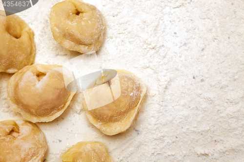 Image of dumplings in flour 