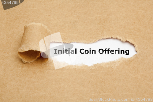 Image of Initial Coin Offering Torn Paper Concept