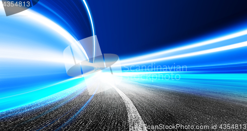 Image of motion blur in futuristic tunnel 