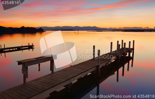 Image of Lovely old timber jetty at sunrise