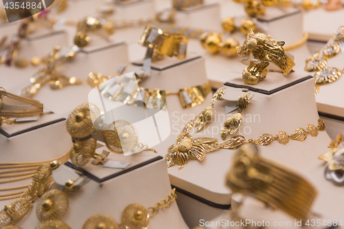 Image of gold jewelry in the shop window