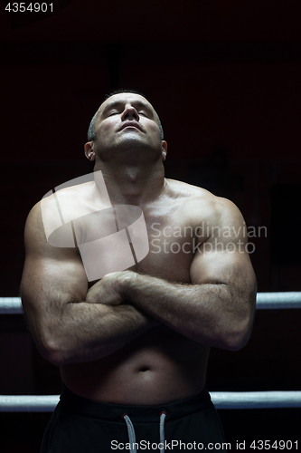 Image of kickboxer with arms crossed