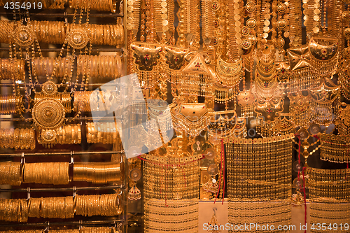 Image of gold jewelry in the shop window