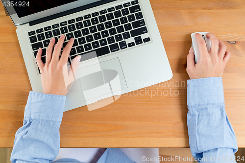 Image of Woman use of notebook computer