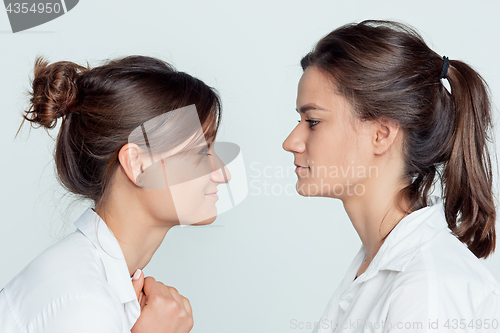 Image of Studio portrait of female twins