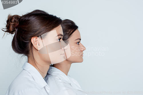 Image of Studio portrait of female twins