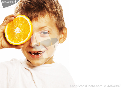 Image of little cute boy with orange fruit double isolated on white smili