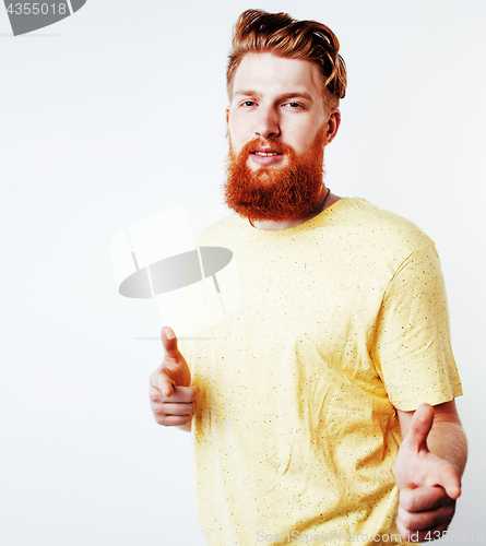 Image of young handsome hipster ginger bearded guy looking brutal isolate