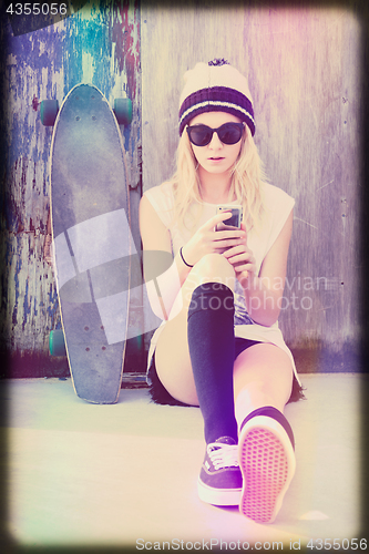 Image of Skater Girl Texting