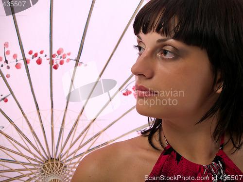Image of Lady with asian umbrella