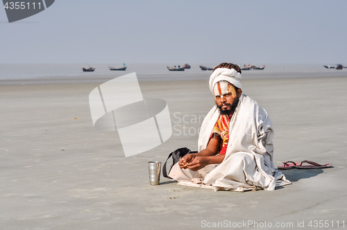 Image of Man with black beard in West Bengal