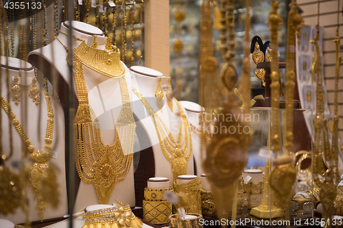 Image of gold jewelry in the shop window