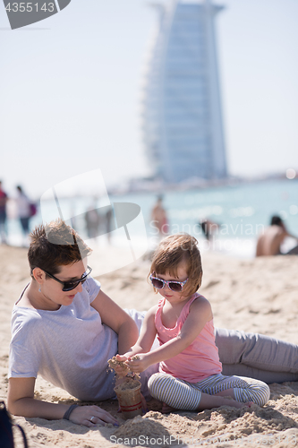 Image of Mom and daughter on the beach