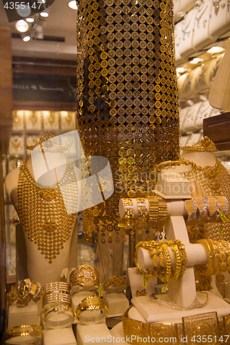 Image of gold jewelry in the shop window