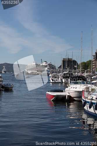 Image of BERGEN HARBOR, NORWAY - MAY 27, 2017: Private boats on a row alo