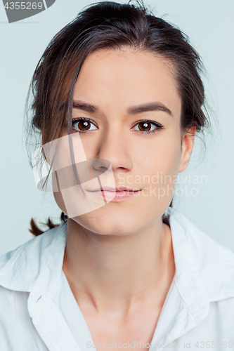 Image of The young woman\'s portrait with thoughtful emotions