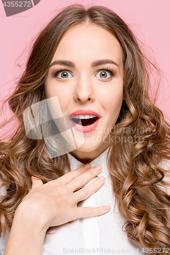 Image of Surprised happy beautiful woman looking in excitement.