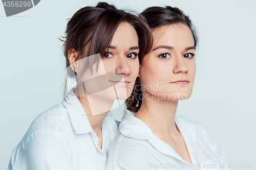 Image of Studio portrait of female twins