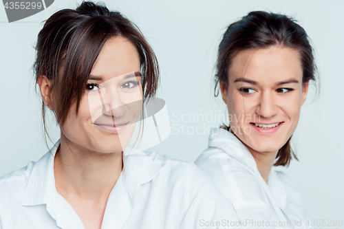 Image of Studio portrait of female twins