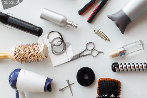 Image of scissors, hairdryers, irons and brushes